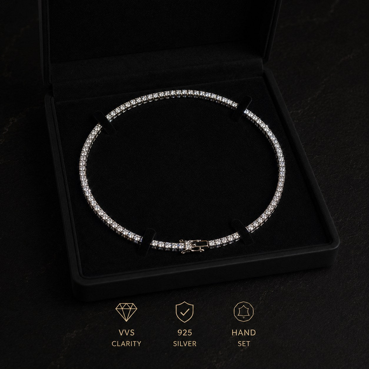 Diamond tennis chain displayed in a luxury black box